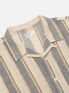 Close-up of the Grey/Yellow Cotton Lattice Road Shirt on a white background. The shirt features a striped pattern with grey, yellow, and cream colors. Made from a breathable cotton lattice material.