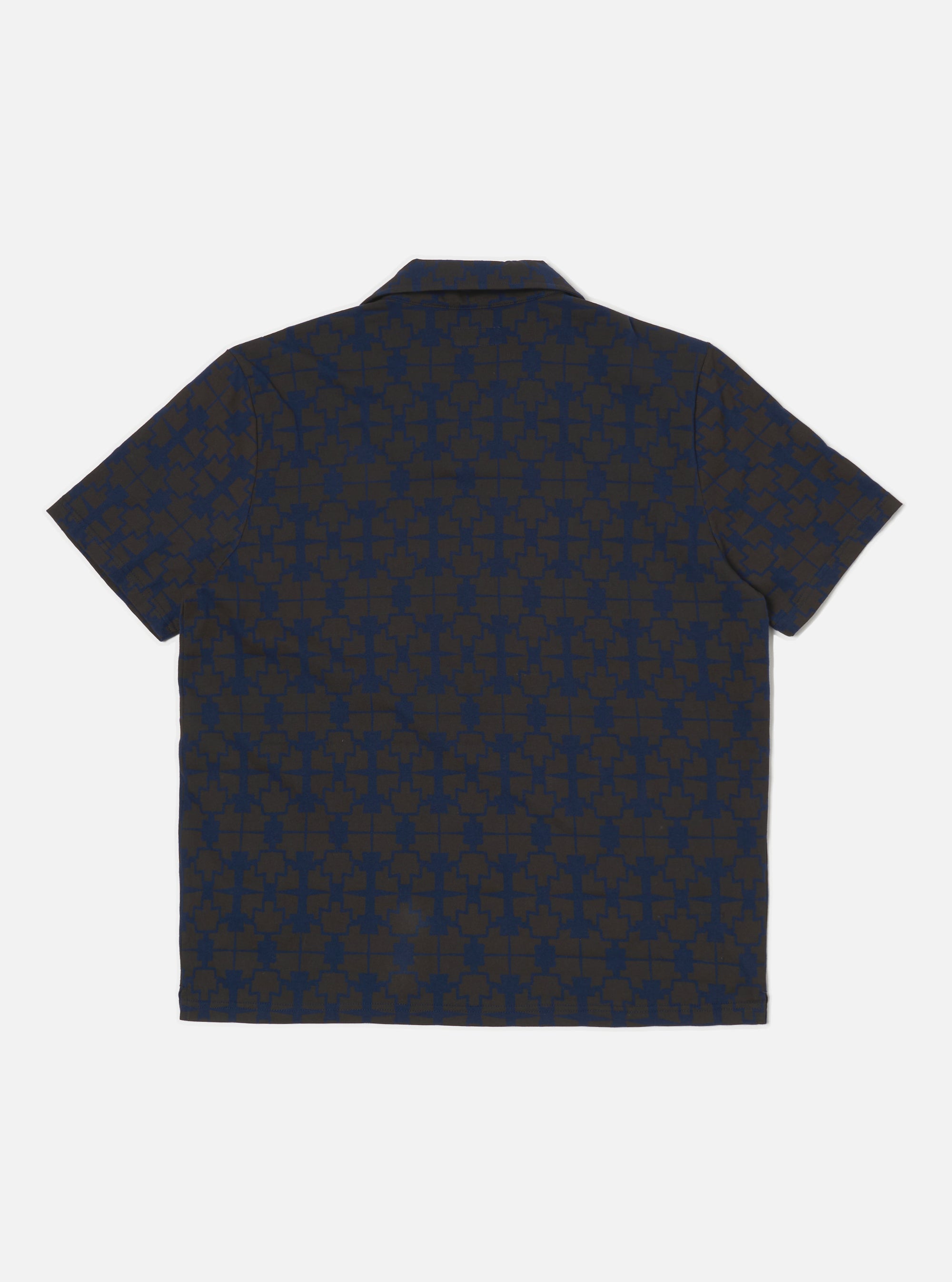 The Navy/Brown Mitla Print Jersey Newlyn Polo shirt on a white background. The polo features a navy and brown geometric print.