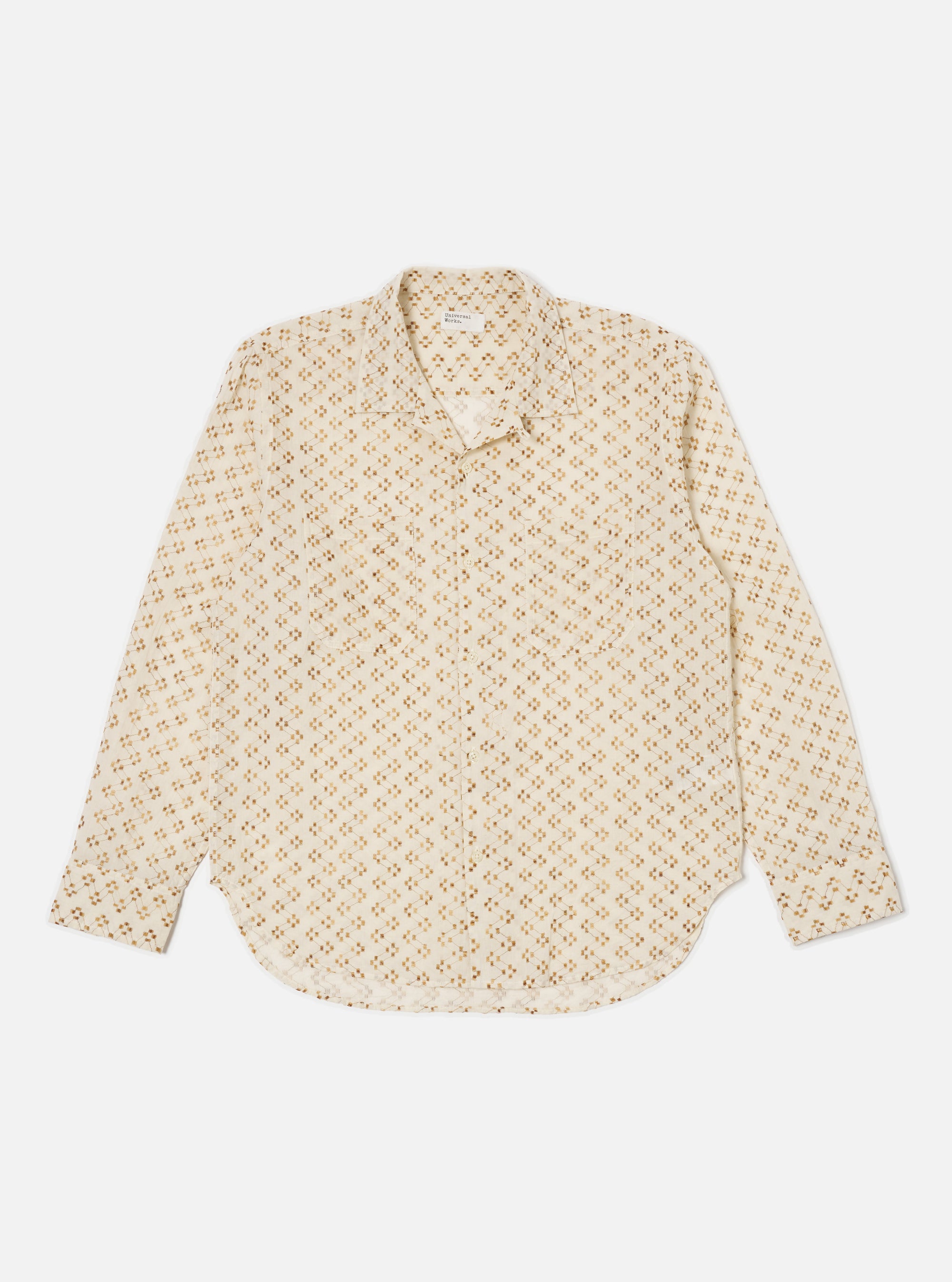 The Camel Mitla Weave Work Shirt, a cream-colored long-sleeve shirt with a brown geometric pattern, is laid flat on a white background.