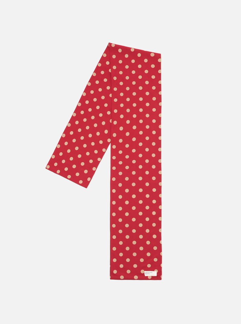 The Red Bold Dot Print Rayon Evening Scarf on a white background. The scarf is red with tan polka dots. The scarf is made of rayon.