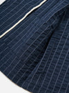A close-up view of the back of the Navy Chester Stripe Two Button Jacket is shown, focusing on the upper shoulders and the classic collar. The garment features a navy blue fabric with thin, light-colored vertical stripes and is displayed flat against a plain white background.