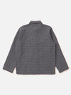 The Grey/Blue Jacquard Weave Field Jacket is displayed from the back, laid flat against a plain white background. The image highlights the straight-cut hem, plain hemmed cuffs, and the textured, knitted check pattern of the fabric.