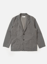 The Mid Grey Linen Slub Weave Two Button Jacket is shown as a flat lay against a solid white background. The jacket features a notch lapel, a two-button front closure, and two large patch pockets at the waist. The mid-grey fabric has a visible, textured slub weave throughout.