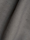 A close-up fabric swatch of the Mid Grey Linen Slub Weave Two Button Jacket highlights the textured, grainy finish and distinct horizontal slubbing of the mid-grey linen and cotton blend fabric.
