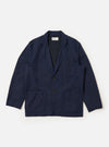 The Navy Linen Slub Weave Two Button Jacket is displayed as a flat lay against a plain white background. The jacket features notched lapels, a two-button front closure, and two flap pockets at the waist. The navy blue fabric has a prominent slub texture with visible variations in the weave.