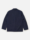 The Navy Linen Slub Weave Two Button Jacket is shown from the back, laid flat against a plain white background. The image highlights the garment's structured rear construction, including two back vents and the textured navy slub weave.