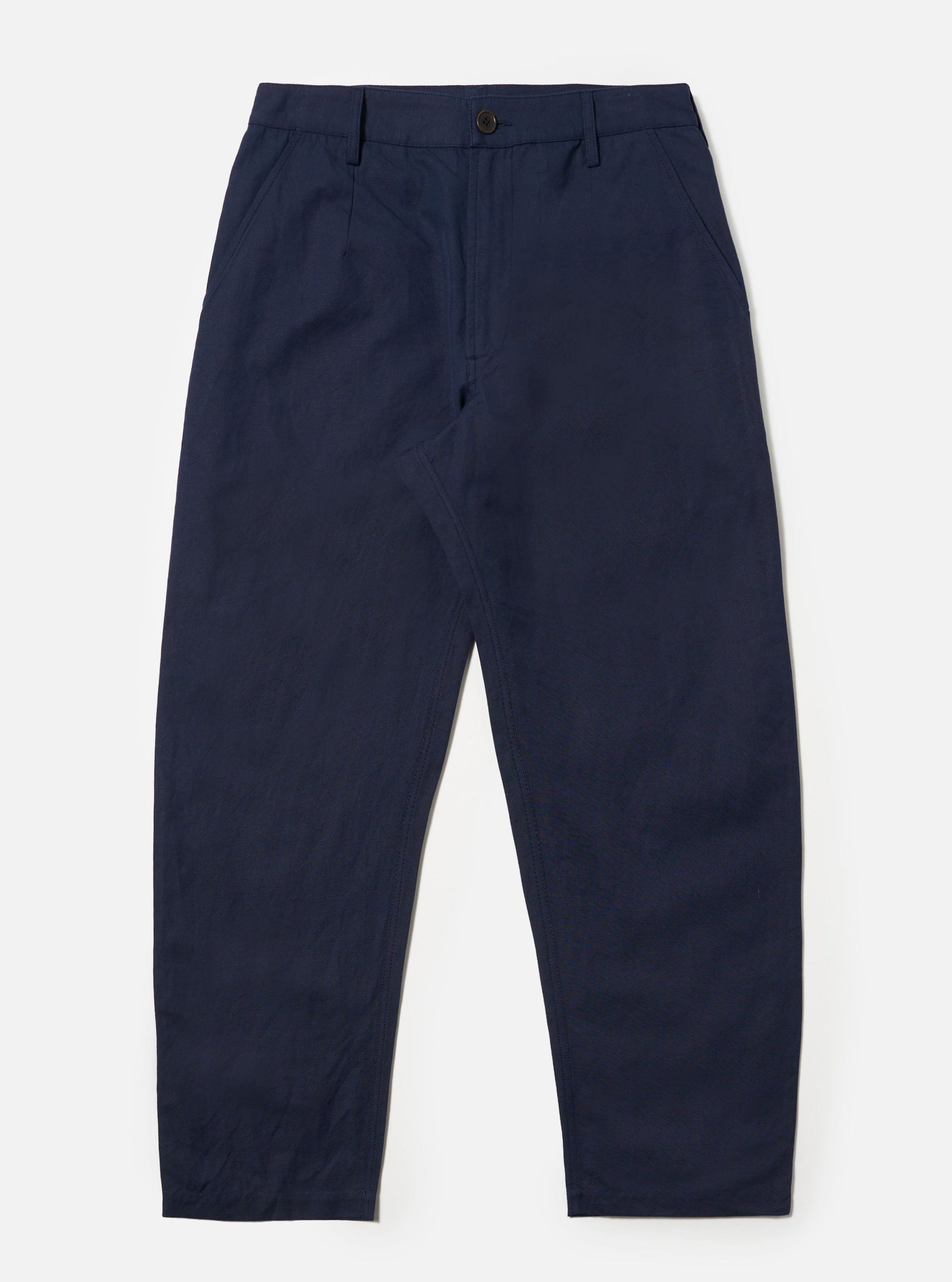 The Navy Linen Slub Weave Dizzy Trouser is shown as a flat lay against a plain white background. The trousers feature a wide, straight-leg silhouette with a visible textured slub weave in the navy blue fabric. The design includes a waistband with belt loops, two front slant pockets, and a button-and-zip fly.