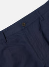 The Navy Linen Slub Weave Dizzy Trouser is shown from the rear, laid flat against a solid white background. The image highlights the wide-leg silhouette, a single rear buttoned flap pocket, and the textured slub weave of the navy fabric.