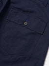A pair of Navy Linen Slub Weave Dizzy Trousers is shown from the back, laid flat against a plain white background. The image highlights the wide-leg silhouette, the textured navy blue linen slub fabric, and a single rear patch pocket.
