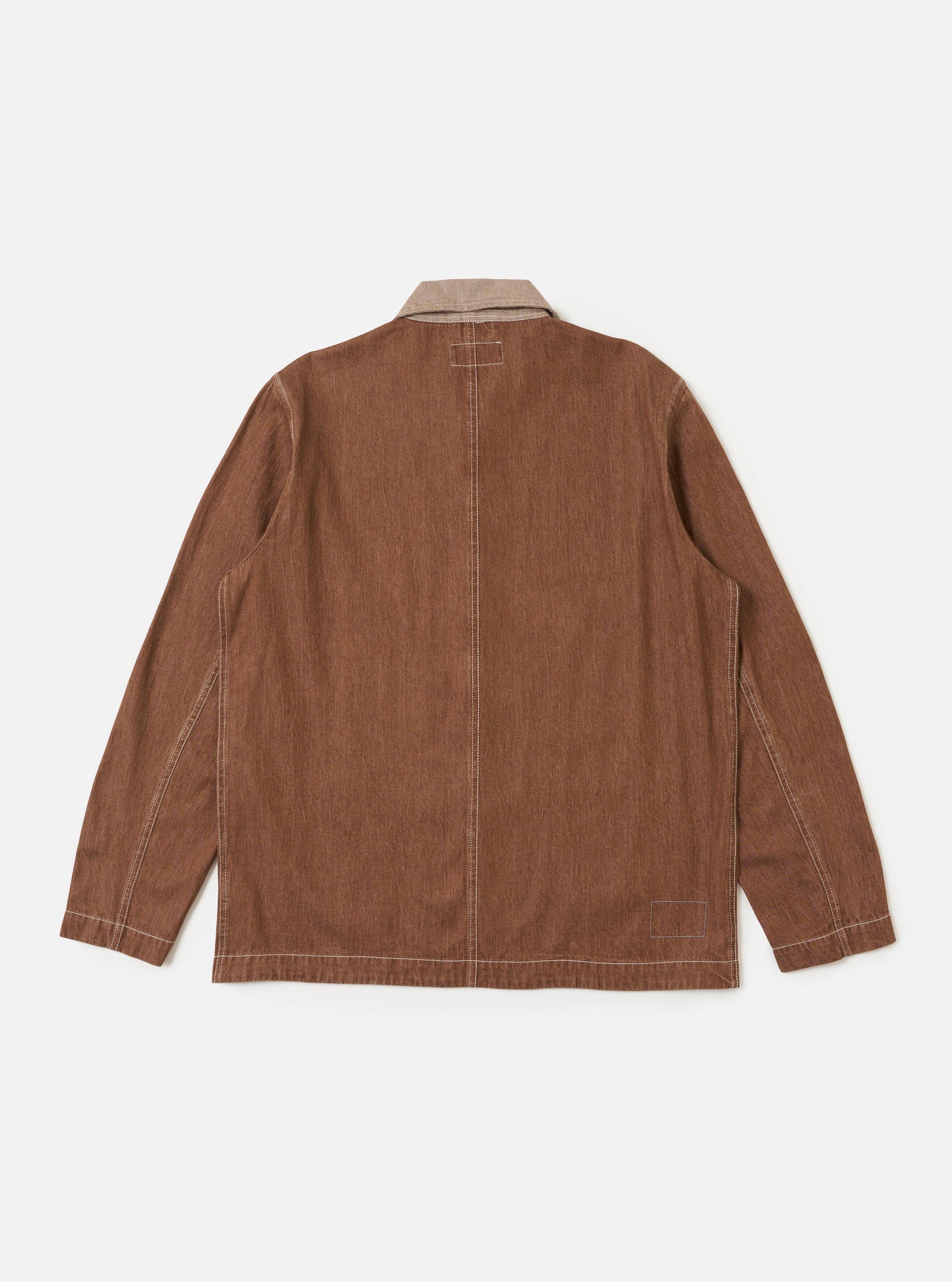 A Brown Meco Denim OG Bakers Jacket is shown from the back, laid flat against a plain white background. The image highlights the central back seam, the two-piece sleeves, and the straight hem of the loose-fitting chore jacket.