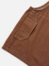The Brown Meco Denim Marine Gilet is shown from the back, laid flat against a plain white background. The image highlights the rear construction of the vest, featuring a large kangaroo pocket spanning the lower back and a small locker loop at the back of the neck.