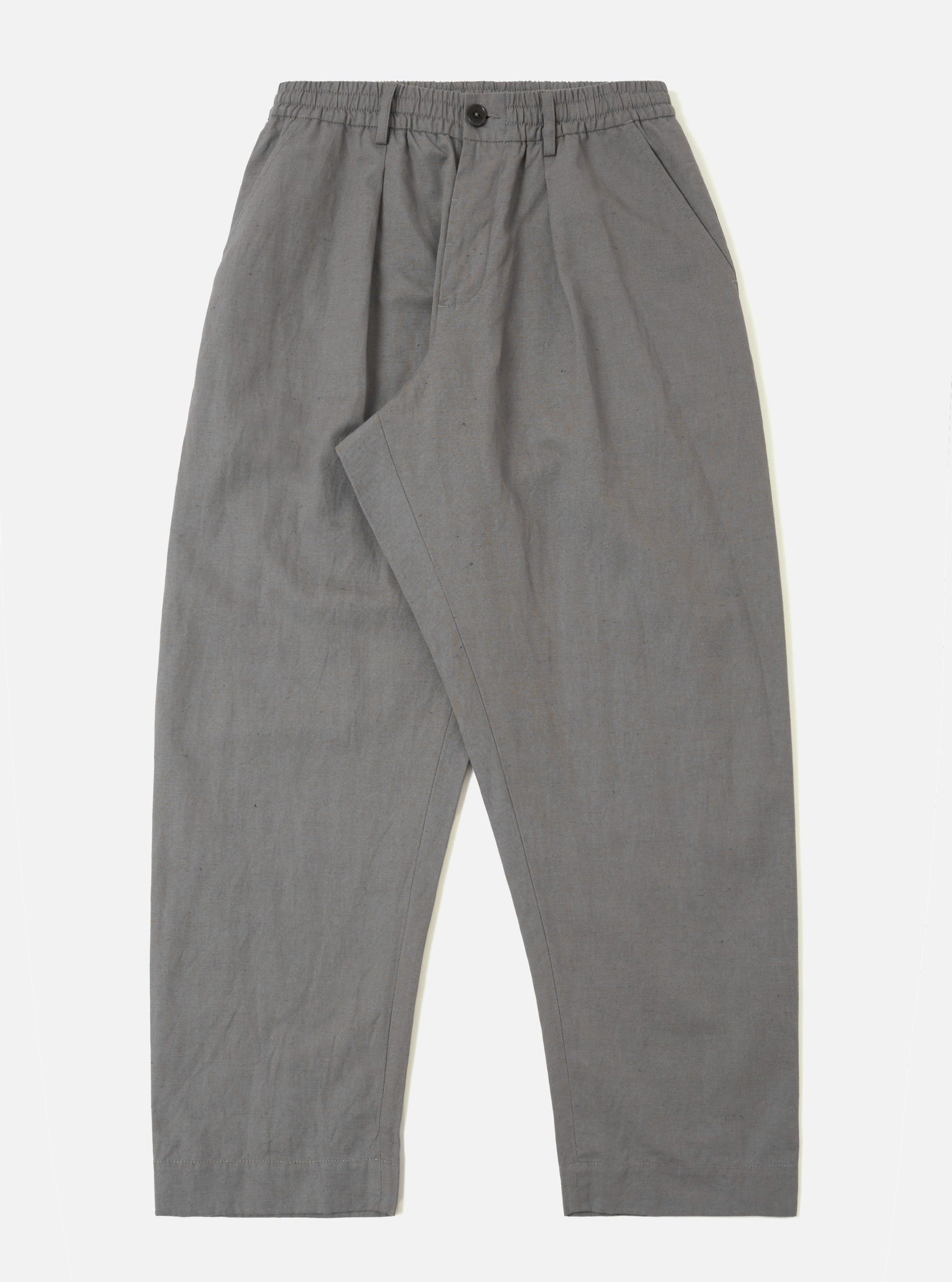 A pair of mid-grey linen slub weave Oxford pants is displayed flat against a plain white background. The trousers feature a wide-leg cut, an elasticated waistband with a matching grey drawstring, a single front pleat, and side pockets. The fabric shows a visible slub texture.