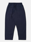 A pair of Navy Linen Slub Weave Oxford Pants is shown from a rear perspective, laid flat against a plain white background. The image highlights the textured slub weave of the fabric, two large rear patch pockets, and an elasticated waistband with a visible drawstring.