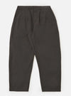 A pair of brown marl tropical suiting Dutch pants is displayed flat against a plain white background. The trousers feature a wide, loose-leg silhouette with visible stitched-down front darts and side buckle waist adjusters.
