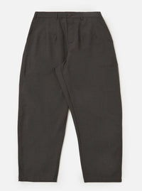 A pair of brown marl tropical suiting Dutch pants is displayed flat against a plain white background. The trousers feature a wide, loose-leg silhouette with visible stitched-down front darts and side buckle waist adjusters.