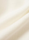 A close-up fabric swatch of the Ecru Brush Back Sweat FM Raglan Sweatshirt highlights the textured, off-white cotton material. The image focuses on the weave and soft finish of the fabric.