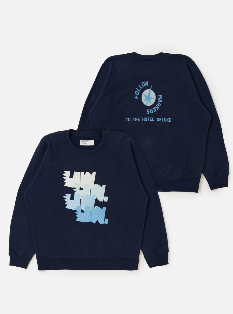 The Navy Brush Back Sweat FM Raglan Sweatshirt is shown laid flat against a plain white background. The image displays both the front and back of the navy blue sweatshirt, highlighting the crew neck, raglan sleeves, and ribbed trim at the collar, cuffs, and hem.