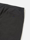A close-up view of the back of a pair of Charcoal Seattle Cotton Military Chinos, focusing on the waistband and a single rear buttoned flap pocket. The charcoal grey cotton fabric is shown against a plain white background.