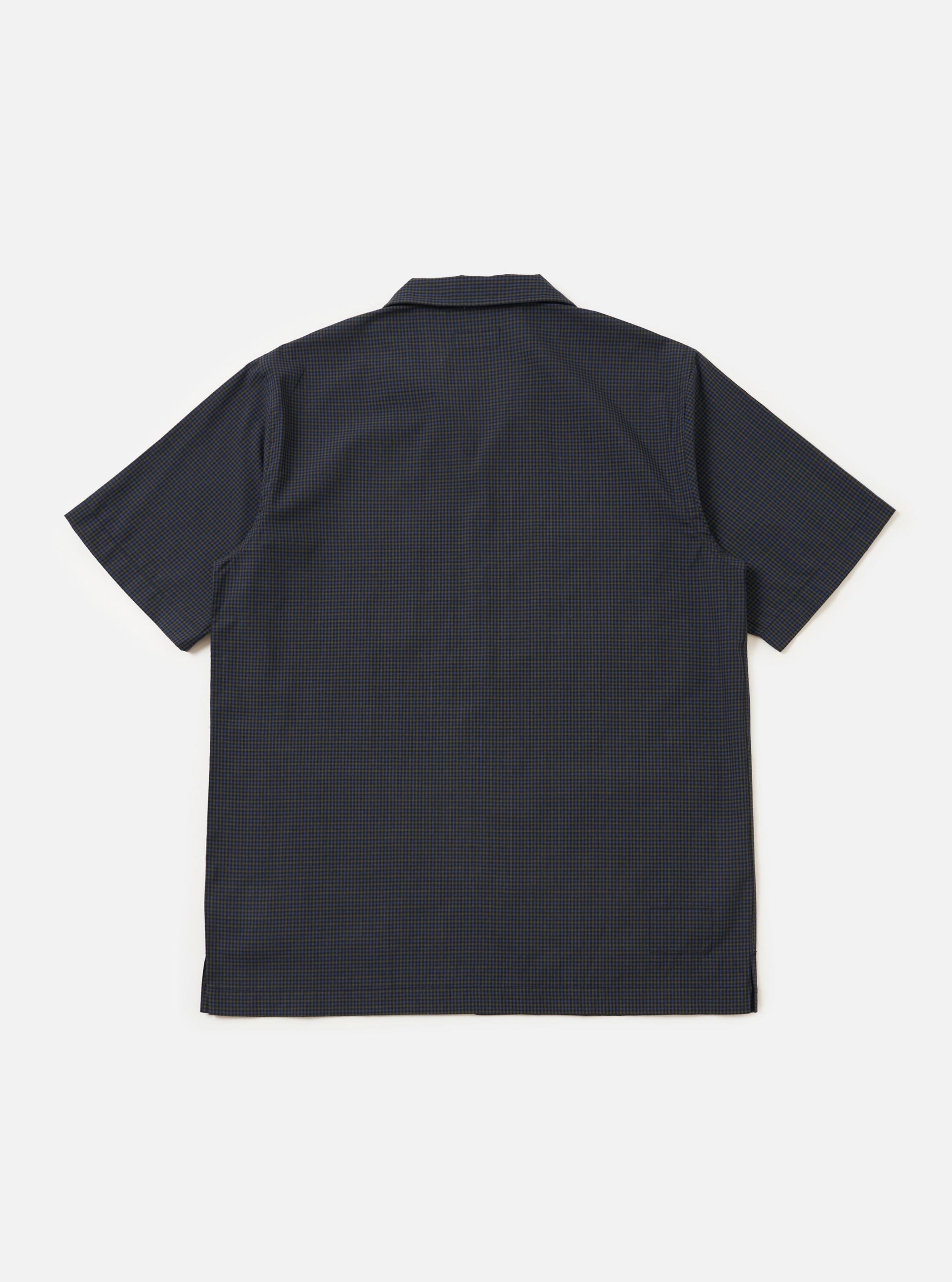 The Navy Check Plaid Summer Overshirt is shown from the back, laid flat against a plain white background. The image highlights the back yoke and the straight hem of the garment.