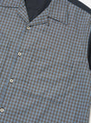 A Mixed Check Plaid Camper Shirt is displayed flat against a plain white background. The garment features a short-sleeve silhouette with a multi-colored patchwork plaid pattern and a camp collar.