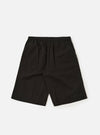 A pair of Black Broadcloth Vacation Shorts is displayed flat against a plain white background. The shorts feature an elasticated waistband with a tonal drawstring and a relaxed, wide-leg fit.
