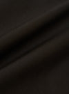 A detailed, close-up fabric swatch of the black cotton broadcloth used for the Vacation Short. The image highlights the fine, tight weave and smooth matte finish of the fabric.