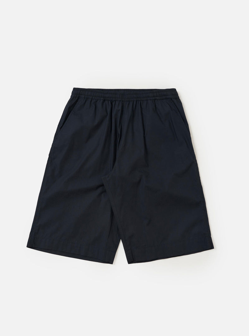 A pair of Navy Broadcloth Vacation Shorts is shown laid flat against a plain white background. The shorts feature a deep navy blue cotton fabric, an elasticated waistband with a drawstring, and a relaxed, straight-leg silhouette.
