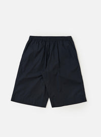 A pair of Navy Broadcloth Vacation Shorts is shown laid flat against a plain white background. The shorts feature a deep navy blue cotton fabric, an elasticated waistband with a drawstring, and a relaxed, straight-leg silhouette.