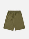 A pair of Olive Broadcloth Vacation Shorts is shown laid flat against a plain white background. The shorts feature a relaxed, wide-leg cut with an elasticated waistband and a tonal olive green drawstring. Key details include two side slip pockets and a clean, lightweight cotton broadcloth texture.