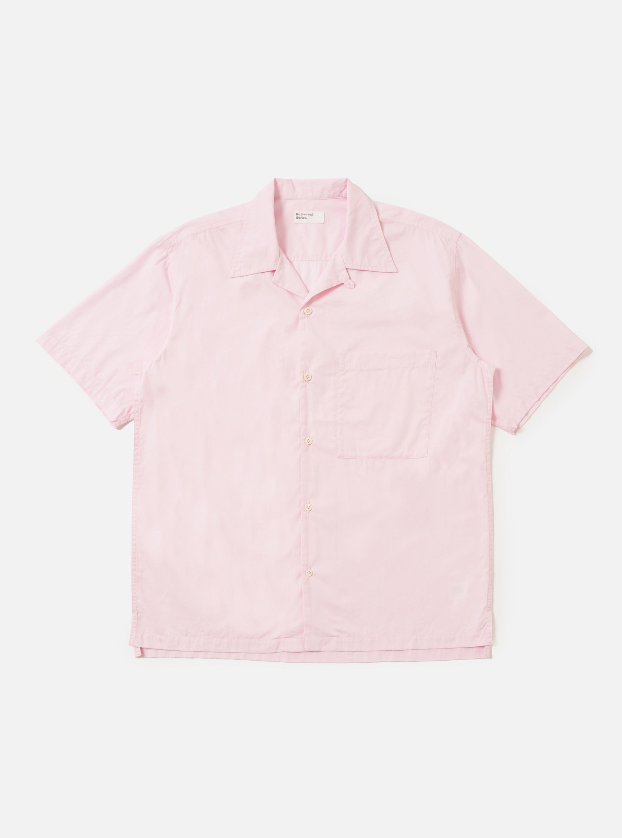 The Pale Pink Broadcloth Camp Shirt is shown laid flat against a plain white background. The shirt features a camp collar, a single chest pocket on the left side, and a full button-down front with tonal buttons.