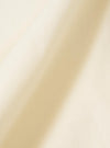 A close-up fabric swatch of the Ecru Broadcloth Lucky Shirt shows a detailed view of the smooth, tightly woven ecru cotton material. The image highlights the fine texture and off-white color of the broadcloth fabric.