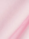 A close-up fabric swatch of the Pale Pink Broadcloth Lucky Shirt highlights the smooth, fine weave and light pink color of the material.