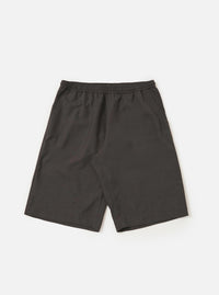 A pair of brown marl tropical suiting vacation shorts is displayed flat against a plain white background. The shorts feature an elasticated waistband with a button closure, side slip pockets, and a relaxed, straight-leg fit.