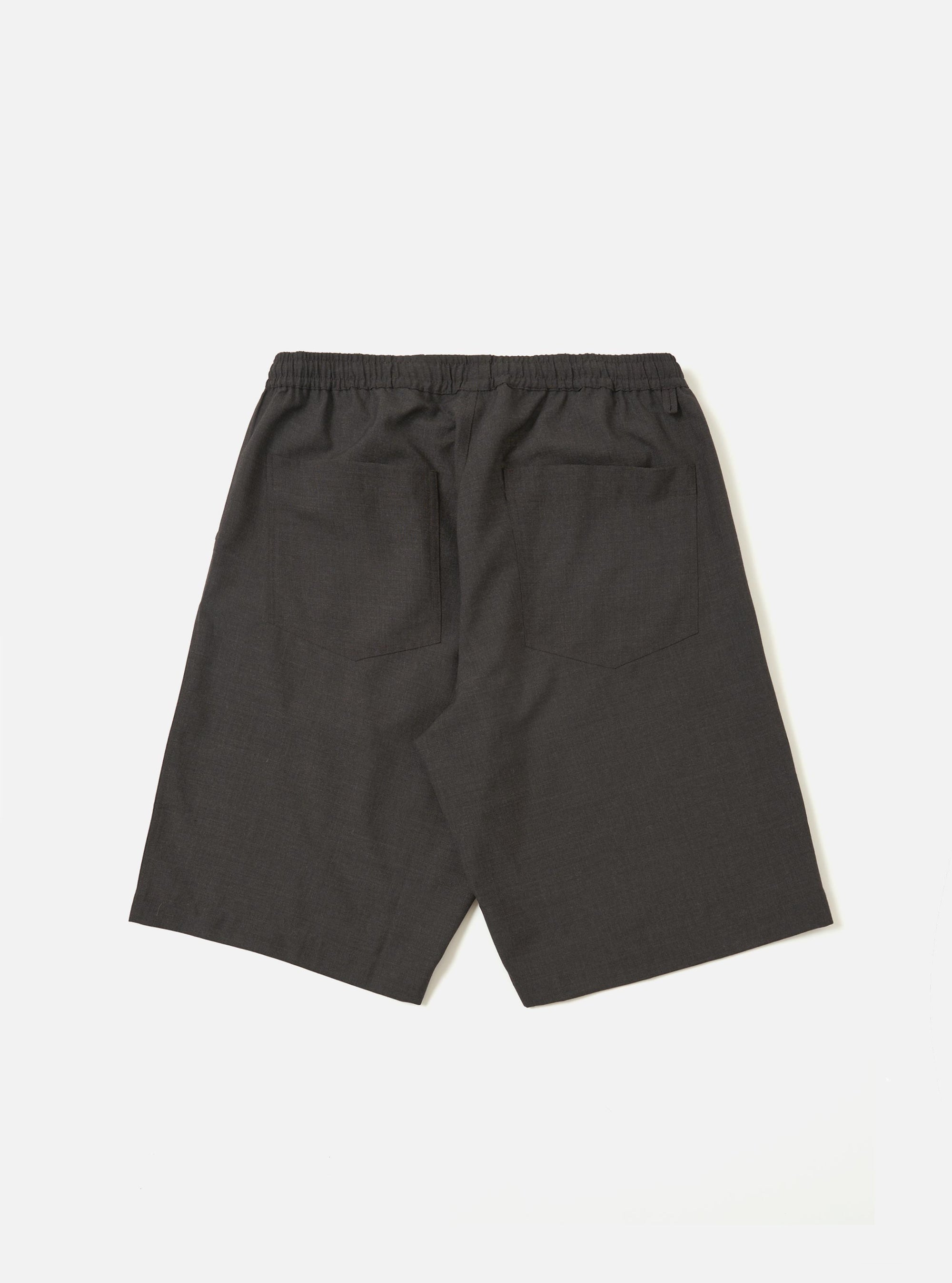 A pair of Brown Marl Tropical Suiting Vacation Shorts is displayed from the back, laid flat against a plain white background. The shorts feature a textured brown marl fabric and a visible rear pocket.
