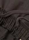 A pair of Brown Marl Tropical Suiting Vacation Shorts is displayed flat against a plain white background. The shorts feature a textured brown marl fabric, an elasticated waistband, and side pockets.