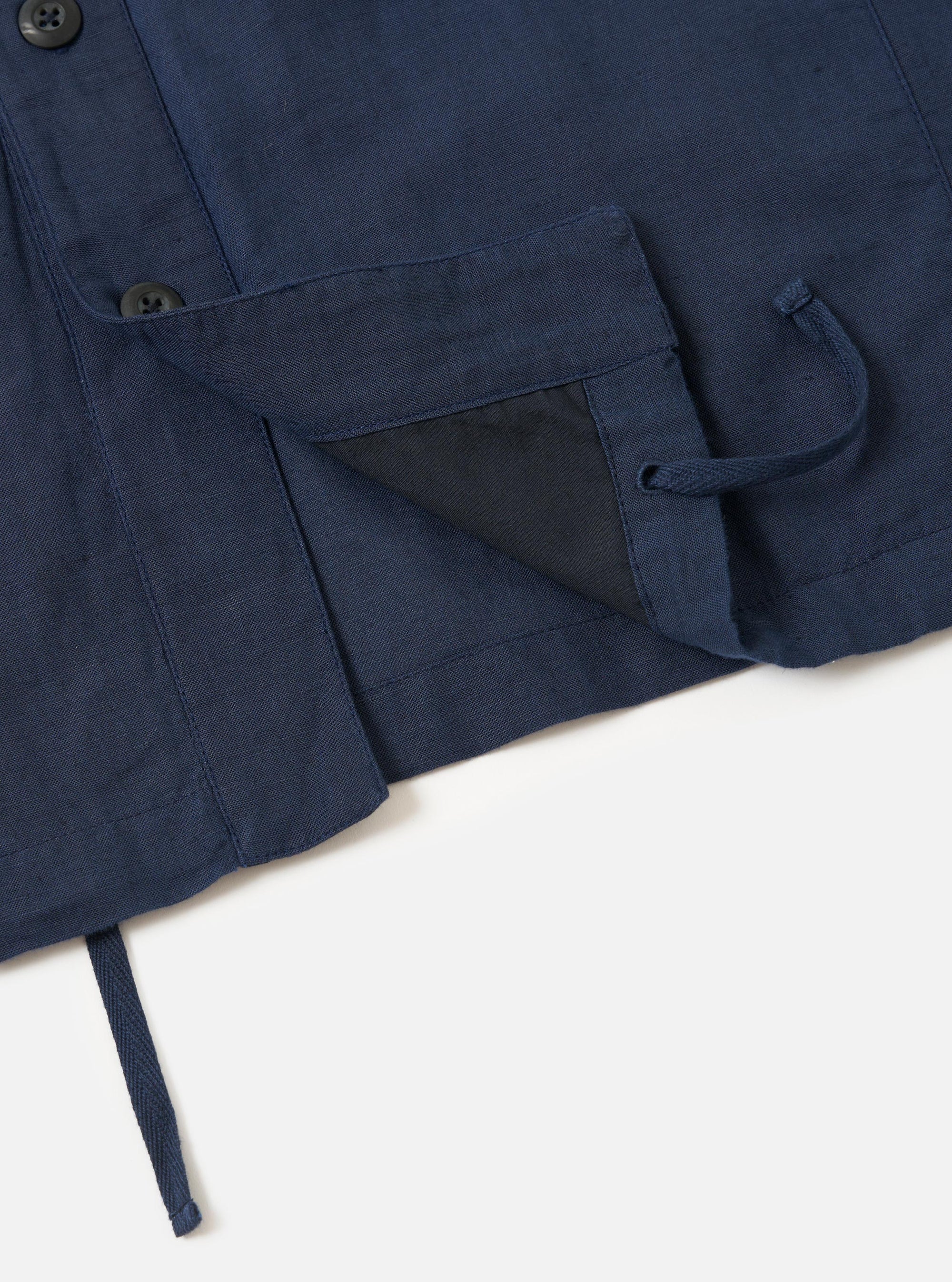 The Navy Linen Cotton Shirting Parachute Shirt is displayed from the back, laid flat against a plain white background. The image highlights the horizontal seam across the upper back and the relaxed, straight-cut silhouette of the garment.