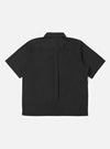 The back of the Black Broadcloth Ewan Shirt is displayed flat against a plain white background. The image highlights the clean construction of the garment's rear, including the back yoke and straight hem.