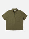 The Olive Broadcloth Ewan Shirt is displayed flat against a plain white background. The shirt features a relaxed, boxy fit with short sleeves, a classic pointed collar, and a distinctive quarter-zip neck closure. The smooth, solid olive green cotton fabric is the prominent feature.