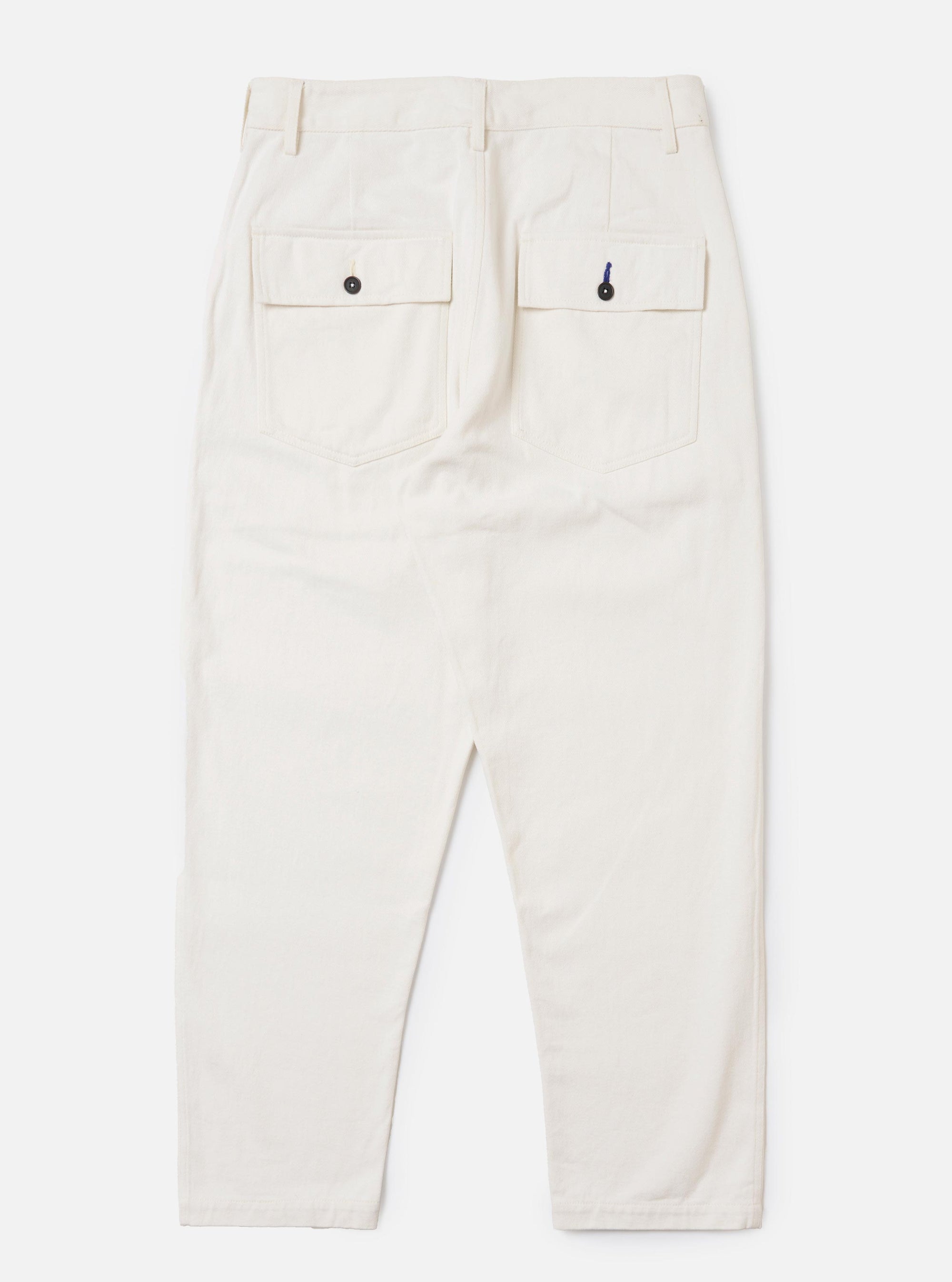 The back of the Ecru Slub Drill Dizzy Trouser is displayed flat against a plain white background. The image highlights the wide-leg cut and the ecru-colored slub cotton fabric. Two large patch pockets are visible on the rear of the trousers.
