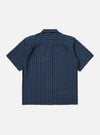 The Navy Chester Stripe S/S Fatigue Shirt is displayed flat against a plain white background. The shirt features short sleeves, a classic button-down front, and two prominent fatigue-style chest pockets with buttoned flaps. The fabric has a vertical navy and white stripe pattern.
