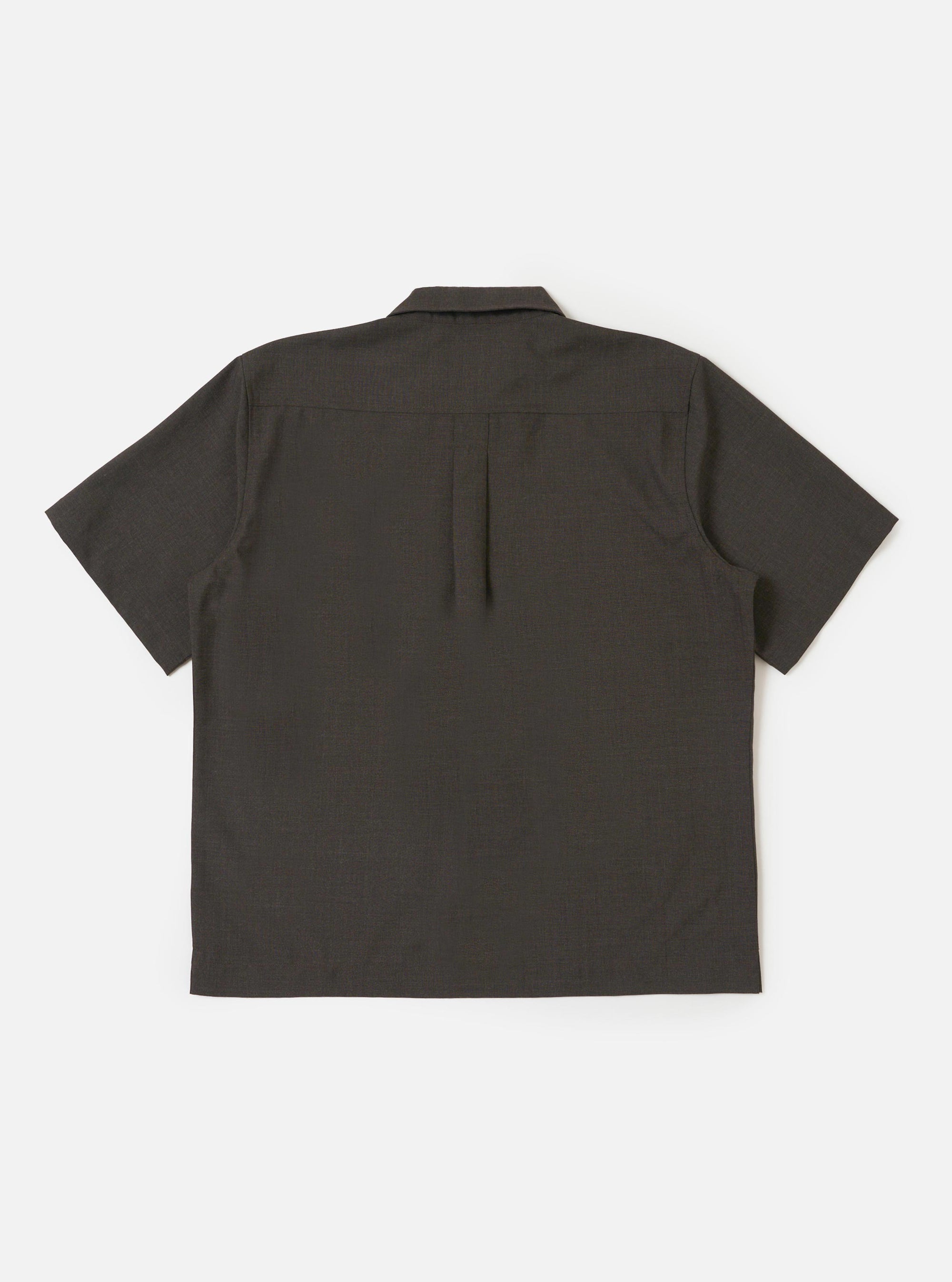 The back of the Brown Marl Tropical Suiting Ewan Shirt is displayed flat against a plain white background. The image highlights the back yoke and a central box pleat designed for a relaxed silhouette. The short sleeves and straight hem are visible, showcasing the textured brown marl fabric.