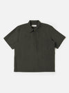An Olive Marl Tropical Suiting Ewan Shirt is displayed flat against a plain white background. The garment is an olive green marl pullover shirt featuring a half-zip front closure, a classic pointed collar, and a single patch pocket on the chest.