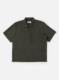 An Olive Marl Tropical Suiting Ewan Shirt is displayed flat against a plain white background. The garment is an olive green marl pullover shirt featuring a half-zip front closure, a classic pointed collar, and a single patch pocket on the chest.