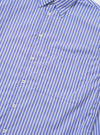 The Blue/White Cotton Stripe Square Pocket Shirt is shown from the back, laid flat against a solid white background. The image highlights the horizontal back yoke and the clean, straight hem of the long-sleeved garment.