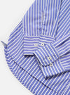The Blue/White Cotton Stripe Square Pocket Shirt is shown from the back, laid flat against a solid white background. The image highlights the horizontal alignment of the blue and white stripes across the back yoke and the vertical stripes on the main body of the shirt.