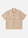 A Brown/White Cotton Stripe Z Tech Overshirt is shown laid flat against a plain white background. The garment features vertical brown and white stripes, a classic pointed collar, a full button-down front, and a vertical zip pocket on the chest.