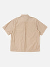 The back of the Brown/White Cotton Stripe Z Tech Overshirt is shown laid flat against a solid white background. The garment features a pattern of vertical brown and white stripes, a straight hem, and a classic pointed collar.