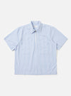 The Sky/White Classic Nipon Stripe Ewan Shirt is shown laid flat against a plain white background. The shirt features a vertical sky blue and white stripe pattern, a classic collar, and a quarter-zip pullover design.