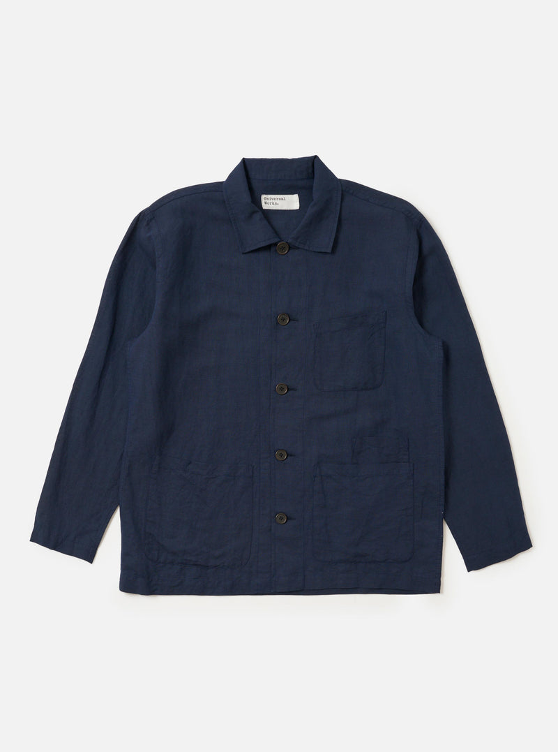 The Navy Linen Cotton Shirting Bakers Overshirt is displayed flat against a plain white background. The garment features a classic collar, a full button-down front, and three prominent patch pockets on the torso. The fabric has a visible textured linen-cotton weave in a deep navy blue color.