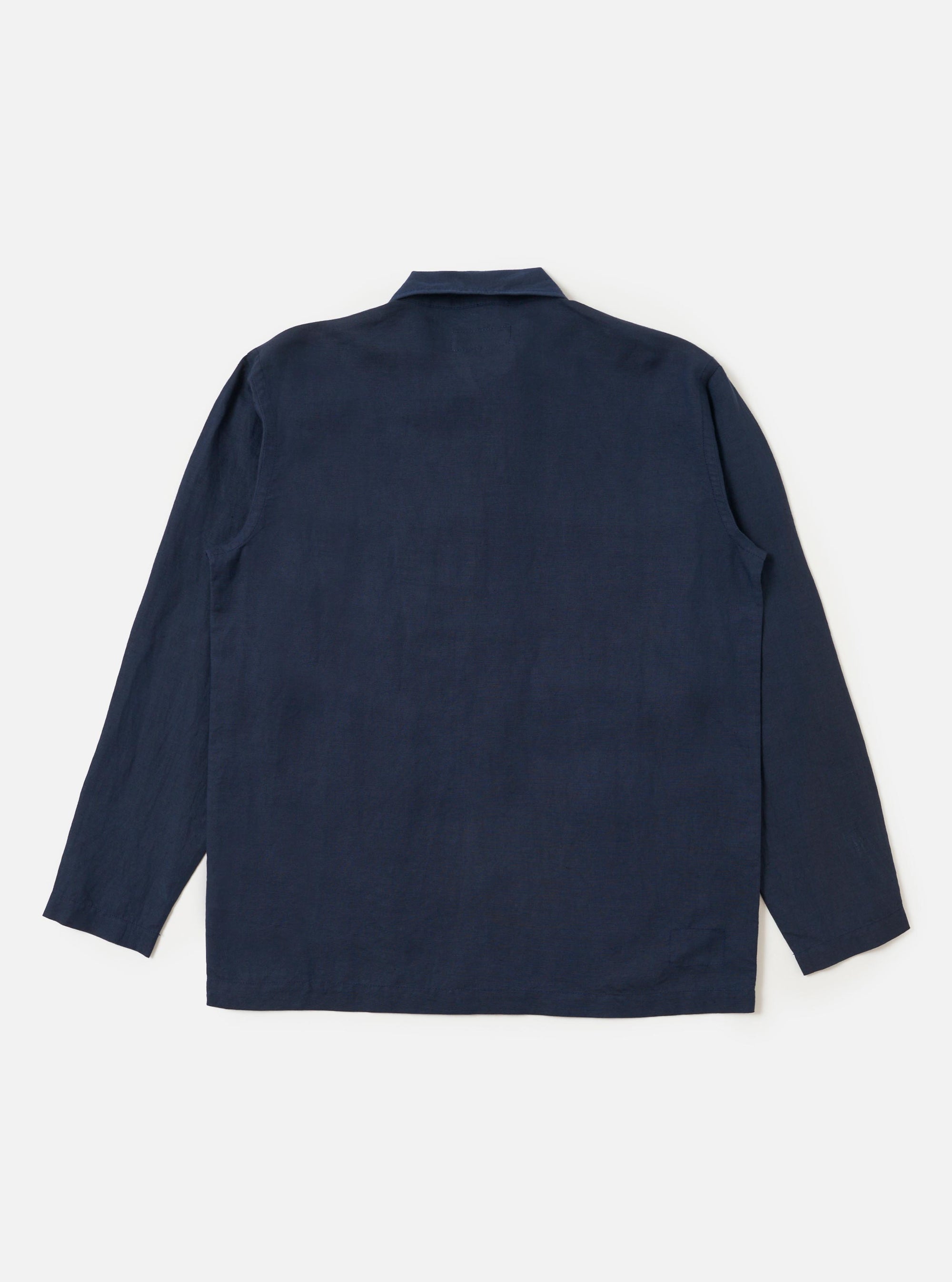 A navy blue linen-cotton blend Bakers overshirt is shown against a plain white background. The garment features a five-button front closure, a one-piece collar, one asymmetric chest pocket, and two large lower patch pockets. It has a straight-cut hem and plain, unbuttoned cuffs.